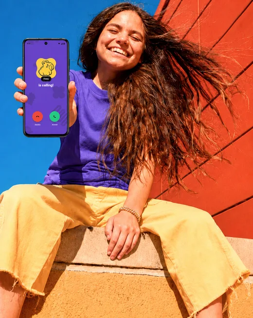 Child holding the Motorola Moto G Play Phone